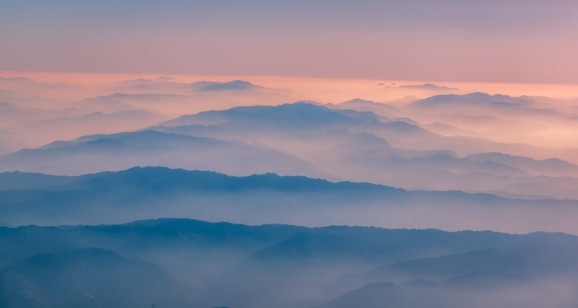 An image of a foggy mountain scenery